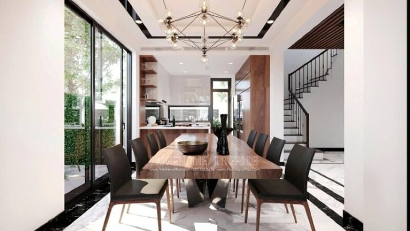 Bố trí nội thất phòng ăn sang trọng từ đồ nội thất cao cấp: bàn gỗ óc chó nguyên tấm, ghế gỗ hiện đại trên nền đá hoa cương . Mẫu nội thất biệt thự đẹp